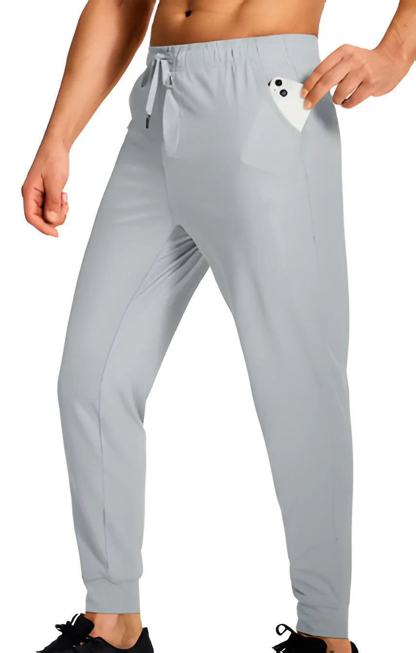 Men's loose fit casual trousers in polyester fabric available in multiple solid colours and sizes