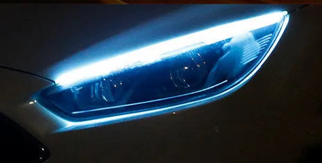 Car LED daytime running light strip in silicone waterproof casing with flowing turn signal effect
