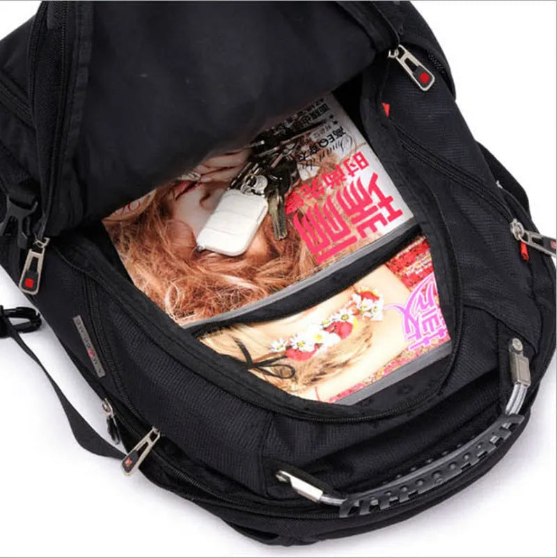 Black business laptop backpack showing multiple compartments and organiser pockets.