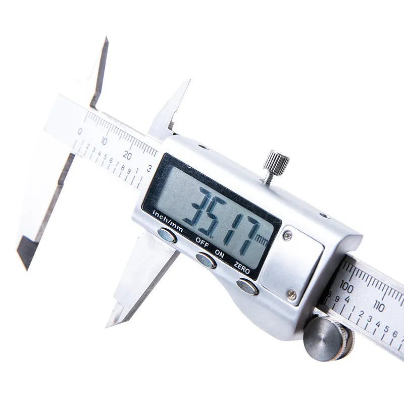 Deli stainless steel digital vernier caliper with 0.01mm resolution and LCD display on workshop surface