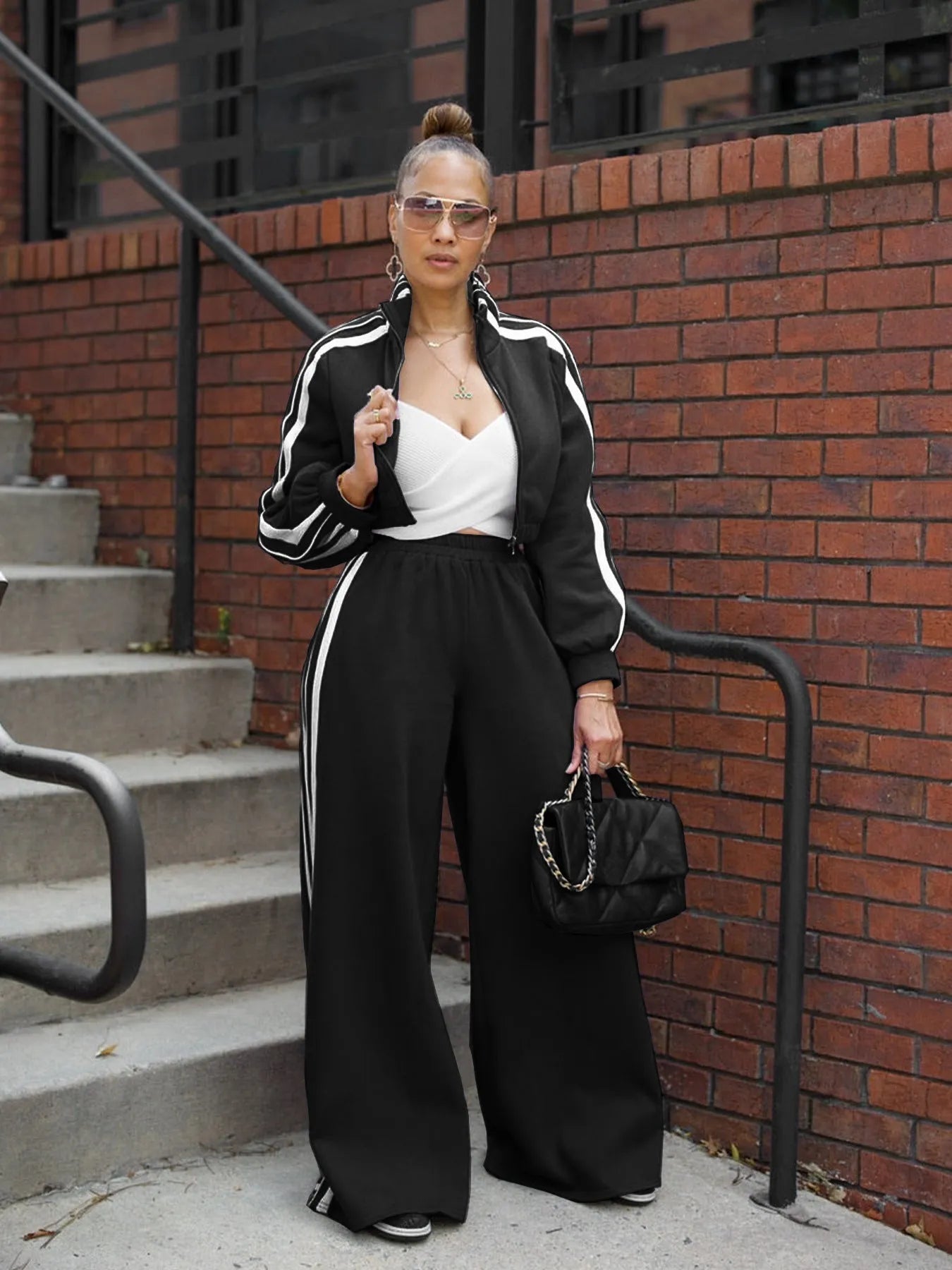 Grey and black striped sweater two-piece set with zipper detail on the top