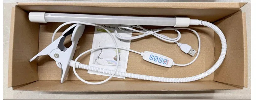 Black and white LED desk lamp with USB cable, 26cm length, for desk use.