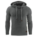 Men's black cotton-polyester blend hooded sweatshirt on a hanger, showcasing the front hood and kangaroo pocket.