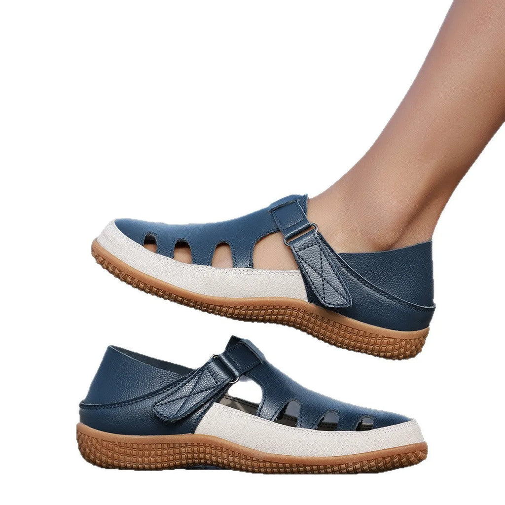 Women's plus size flat heel sandals with hollow toe cap in blue, red, or white on a thick rubber sole.