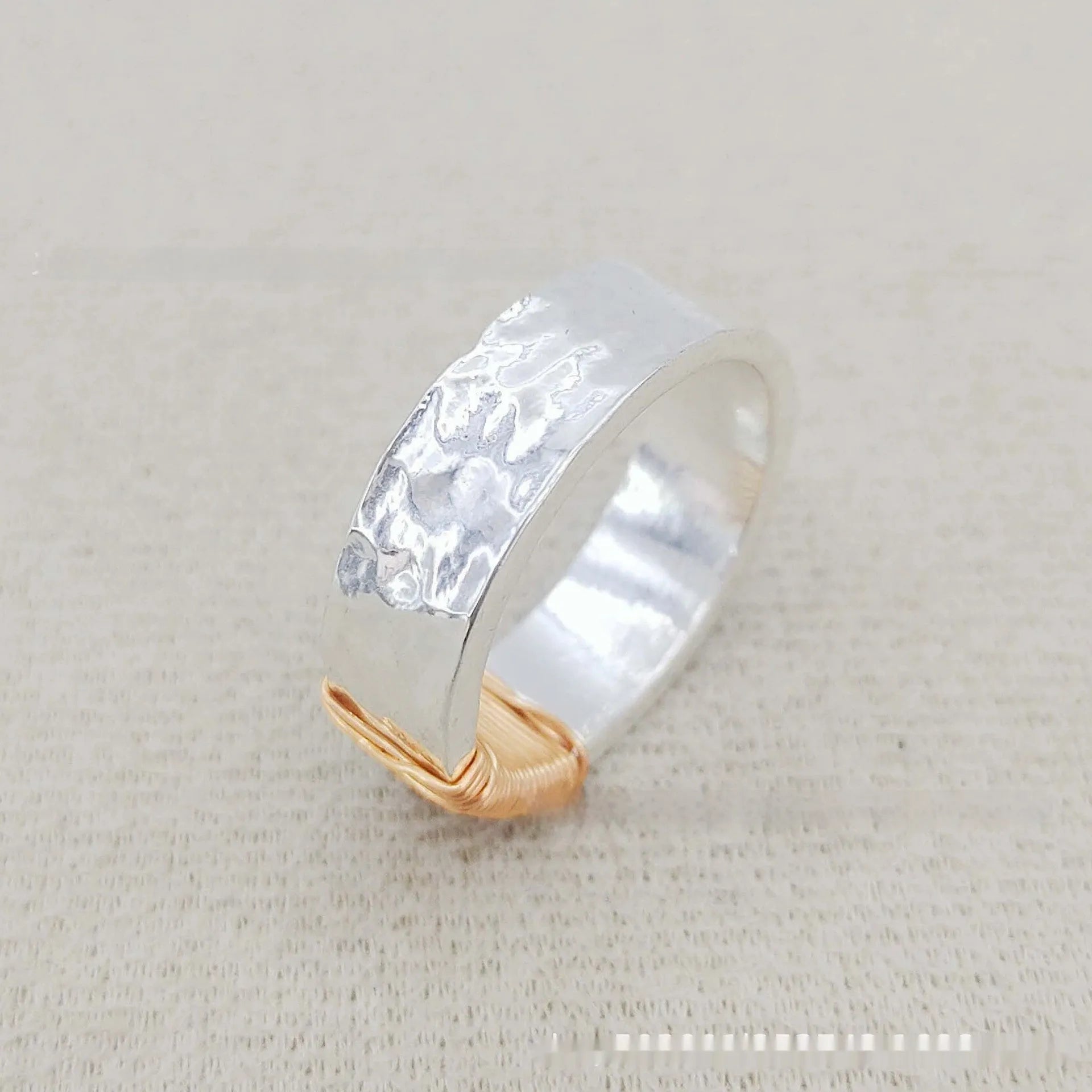 Copper geometric wide-face bracelet with irregular coil design in silver gold electroplated finish