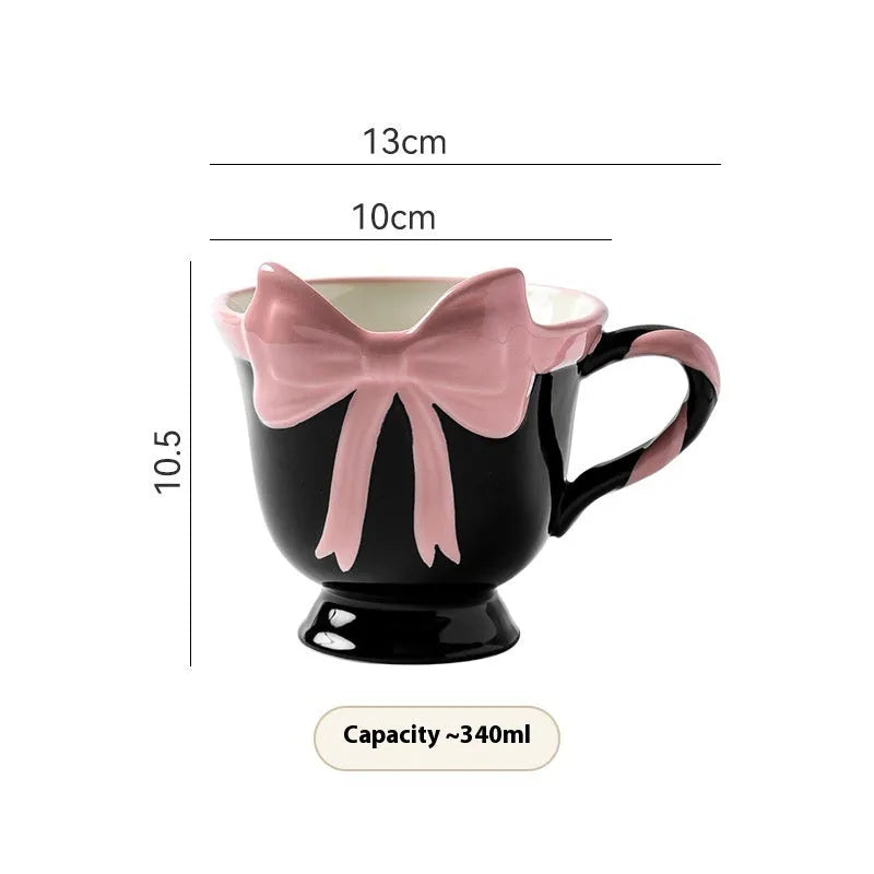 Ceramic mug with girl heart bow design in black pink colour