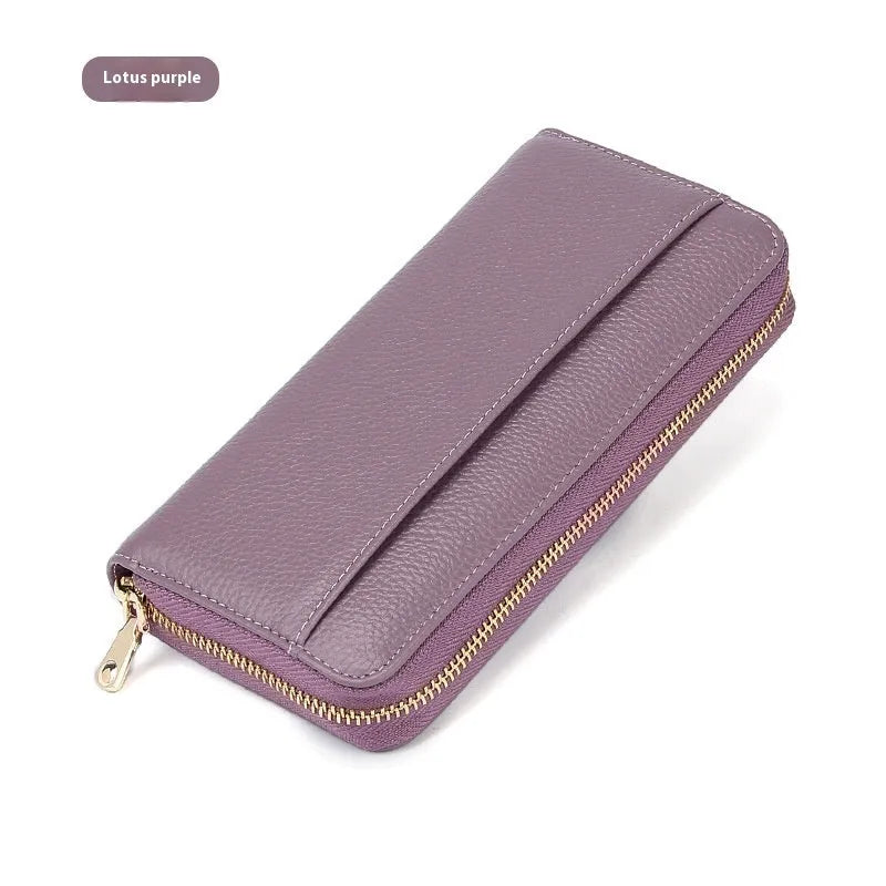 Genuine leather long wallet for women in multiple colours with large capacity and anti-theft card slots.