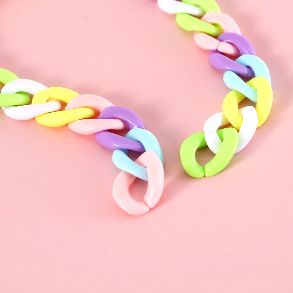 Adjustable plastic pet collar in macaron candy colours for cats, dogs, and rabbits.