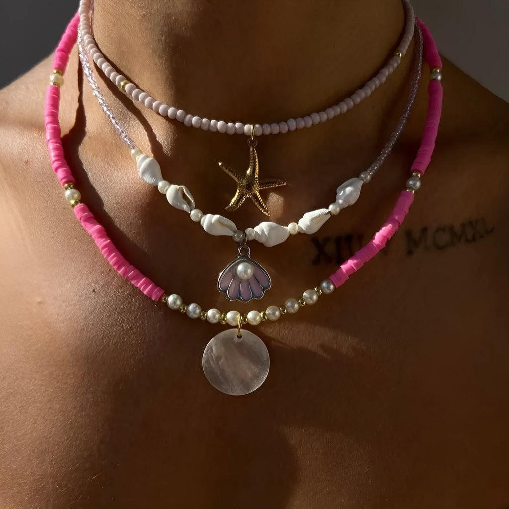 Polymer clay beaded necklace with multi-layer twin clavicle chain and geometric alloy pendant on female model