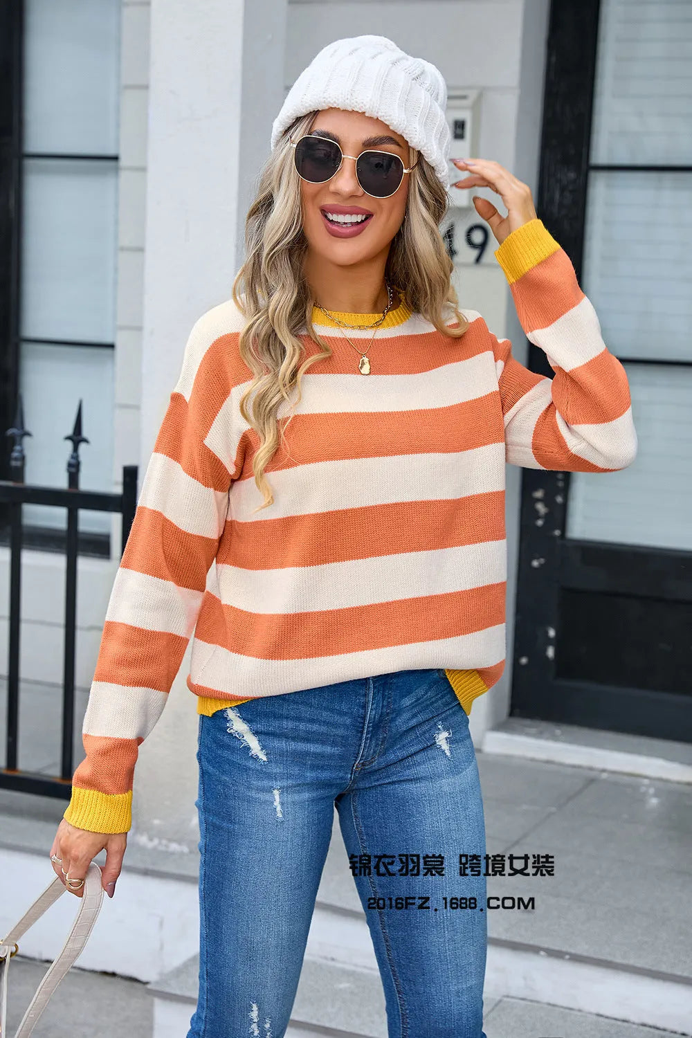 Women's loose fit long sleeve acrylic sweater in blue, round neck, knitted texture