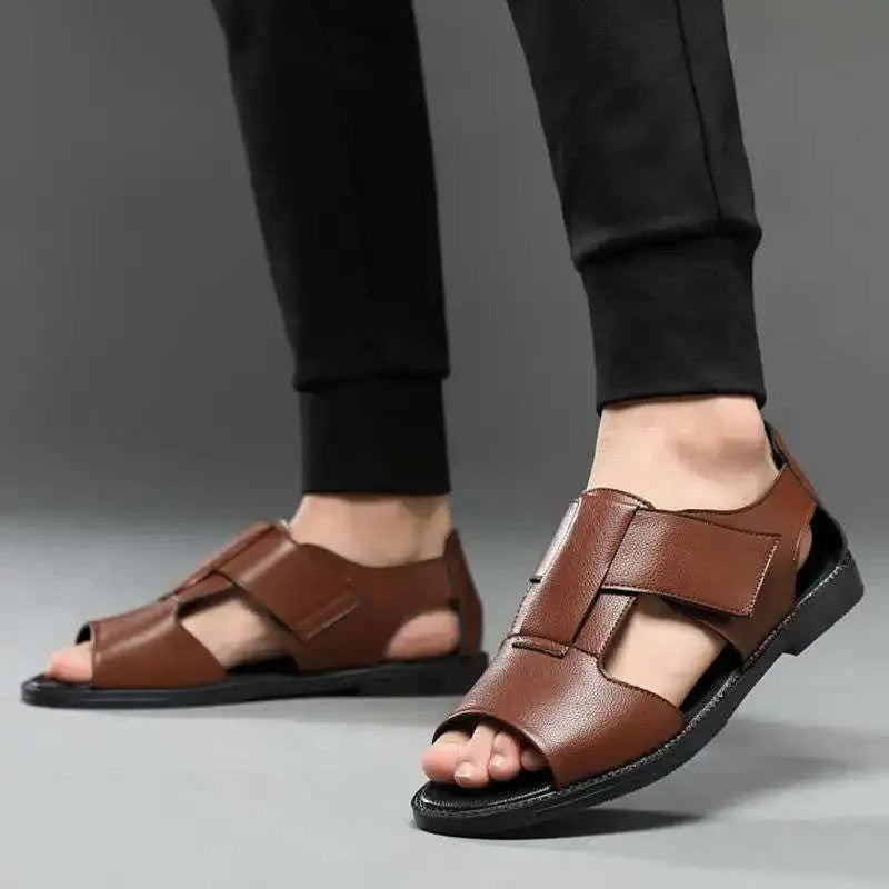 Men's black and brown leather Roman sandals with open-toe design and rubber soles