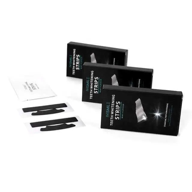 Box of 14 pairs of teeth whitening strips with coconut activated carbon and sodium bicarbonate, in aluminium film bags