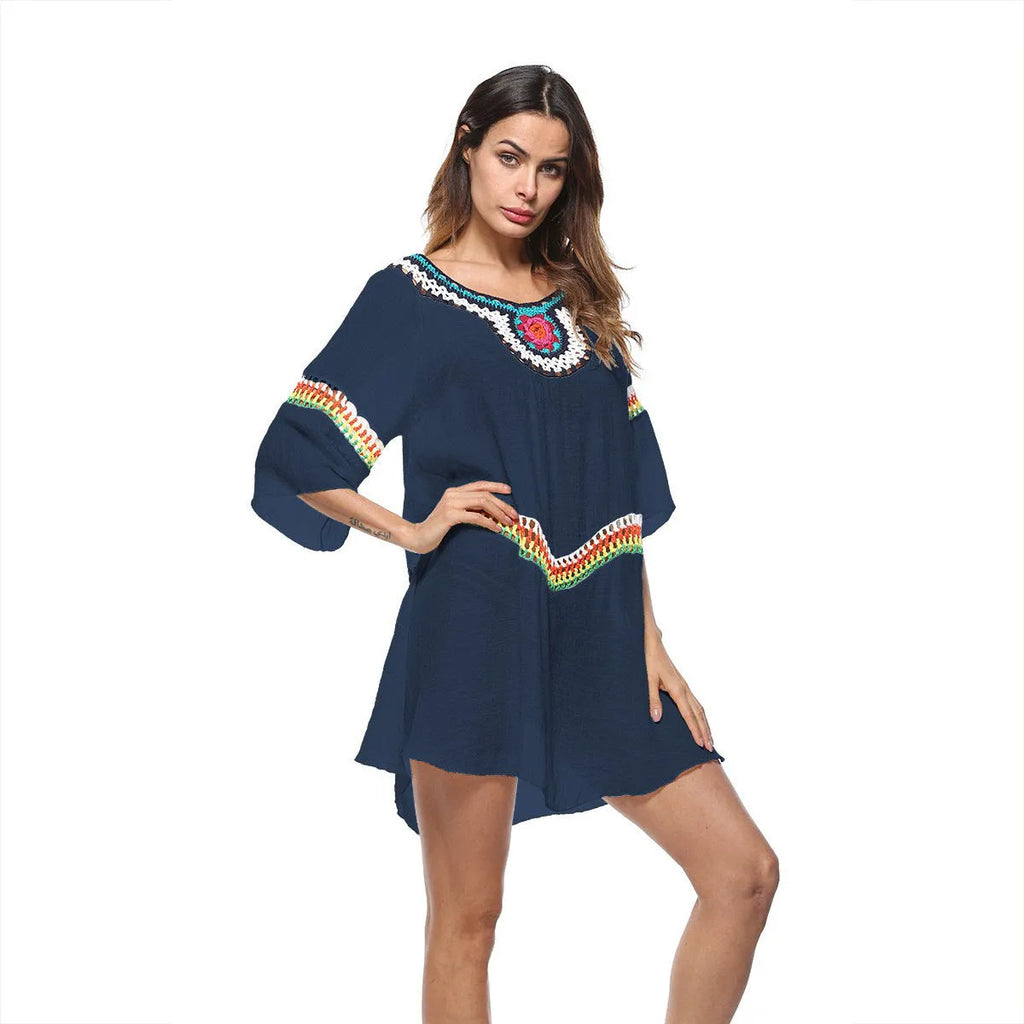 Women's crocheted ethnic style sun protection clothing in apricot colour with beach background