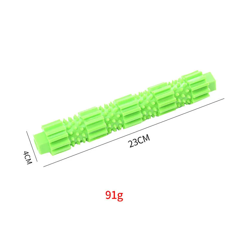 Green and orange durable rubber dog chew toy with squeaker and treat-dispensing hole.
