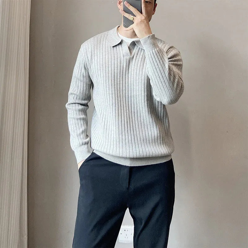 Men's grey striped knitted sweater with a lapel collar, shown in a loose fit.