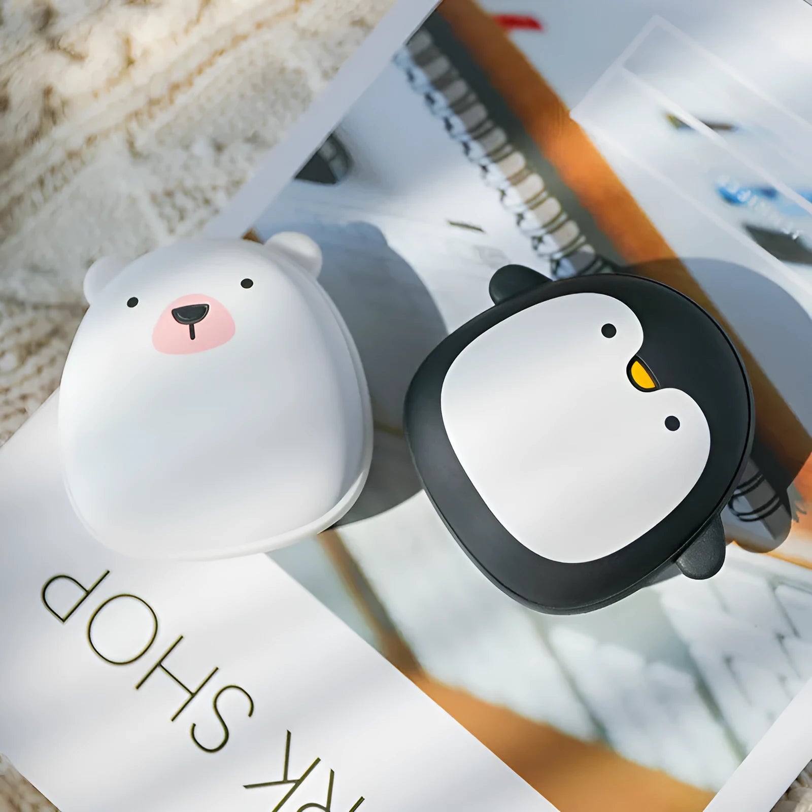 Cute cartoon penguin and polar bear design USB rechargeable electric hand warmer.