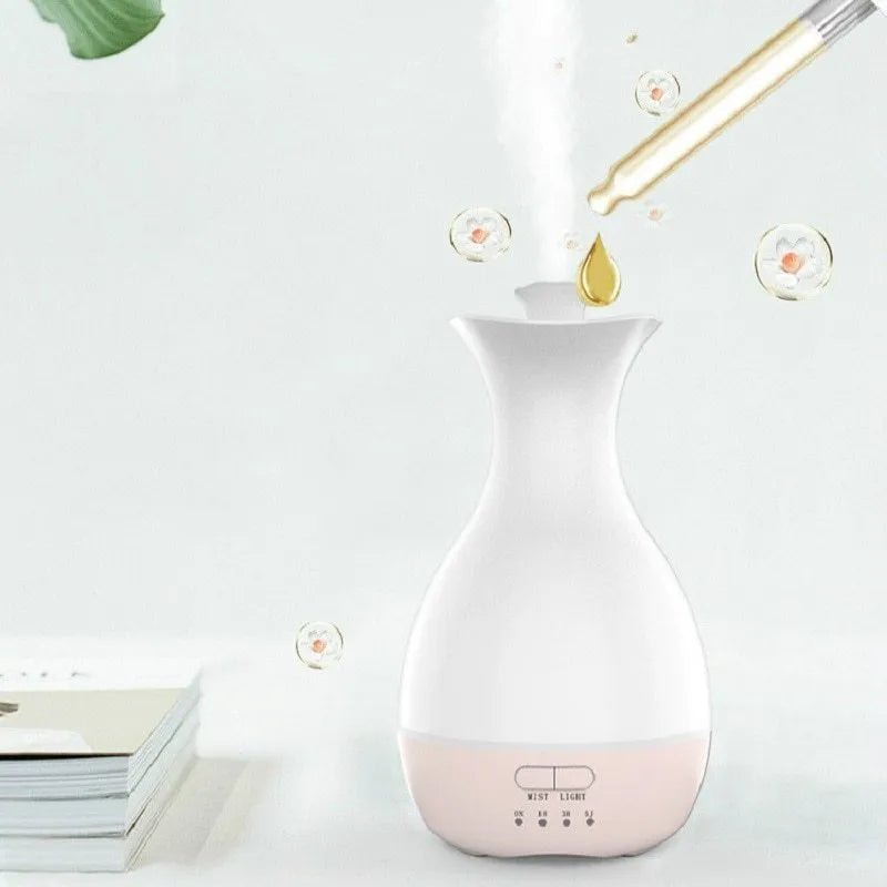 White ultrasonic aromatherapy diffuser and humidifier with colourful night light and 200ml capacity