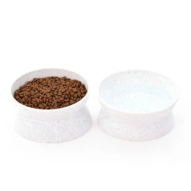Grey elevated cat bowl with pedestal design, oval shape, on a light background