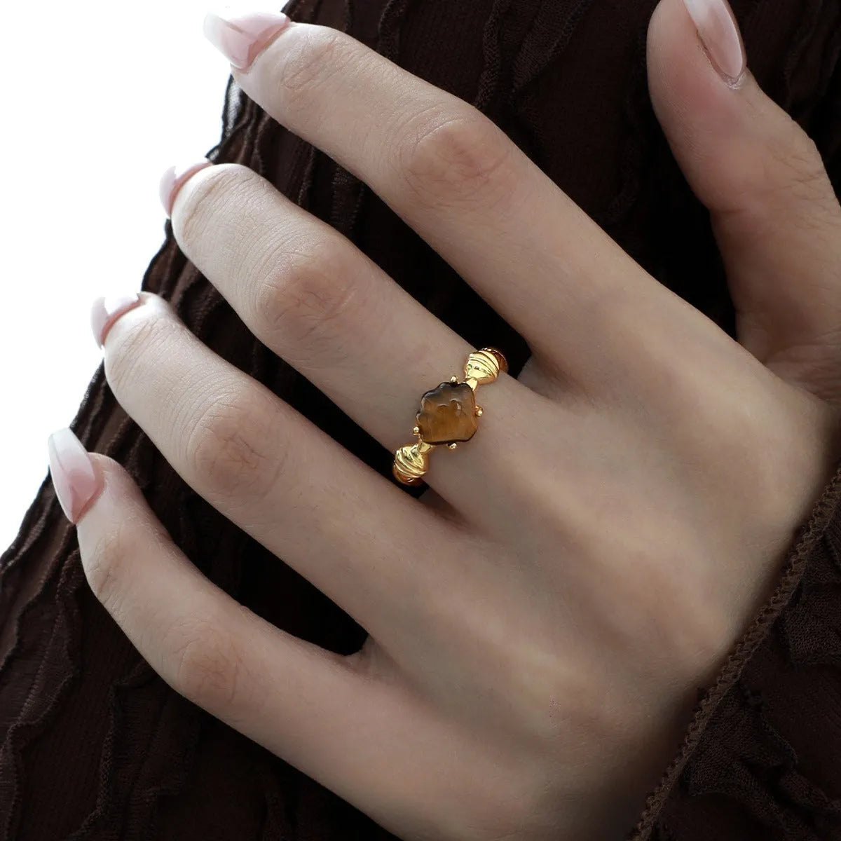 Adjustable sterling silver ring with shell elements and electroplated gold finish