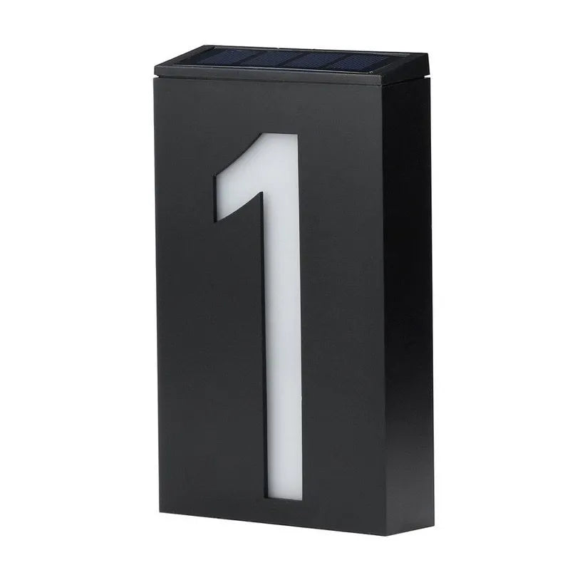 Solar powered outdoor house number light with white LEDs and wall mount.