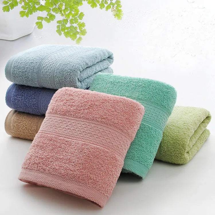 Thickened 800 gsm cotton bath and beach towel shown in apple green colour