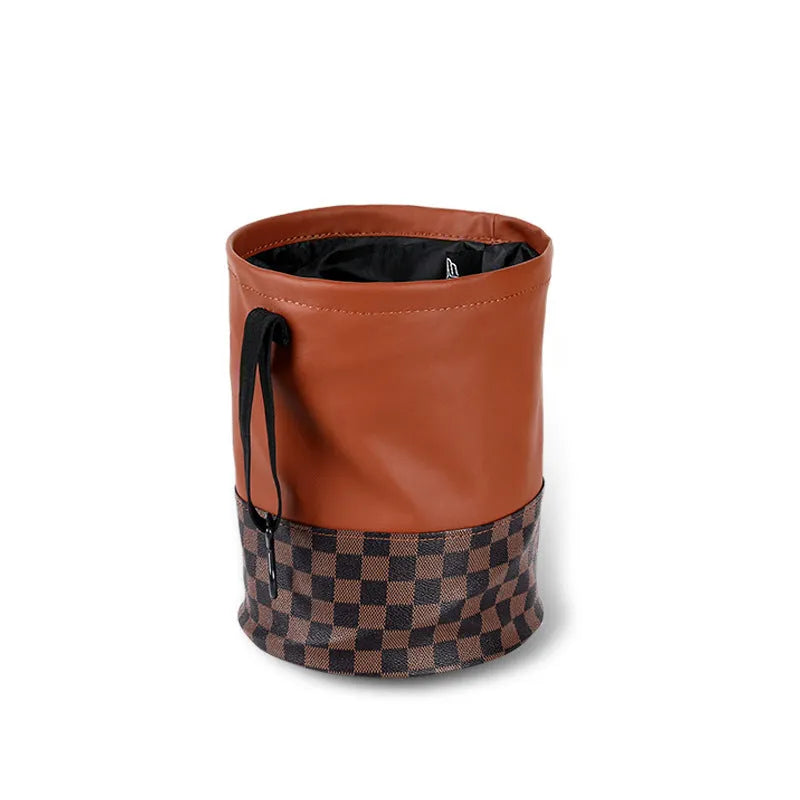 Tan retractable leather car trash can with handle in expanded position