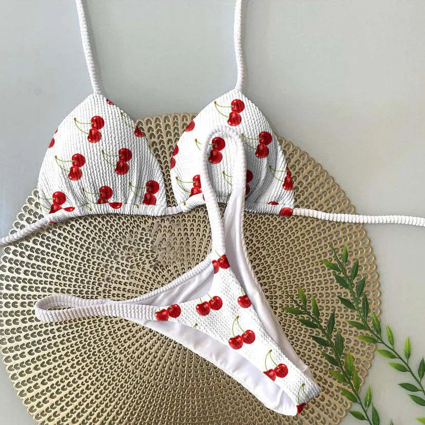 Women's printed bikini swimsuit with briefs style on a neutral background.
