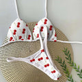 Women's printed bikini swimsuit with briefs style on a neutral background.