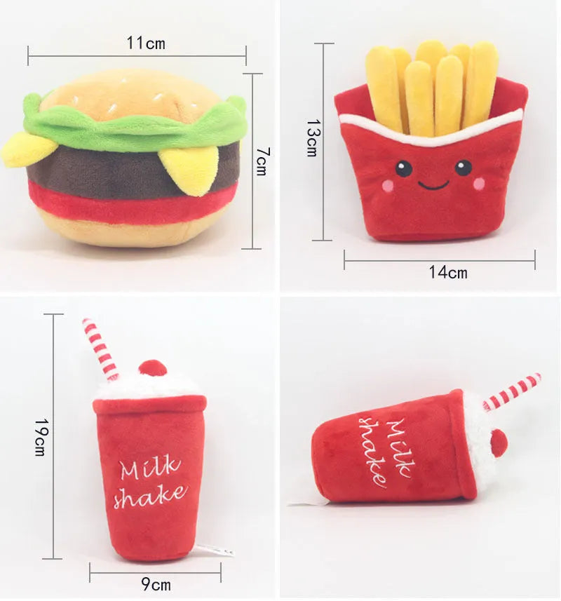 Set of three soft plush sounding toys in shapes of hamburger, french fries, and milkshake cup on a plain background