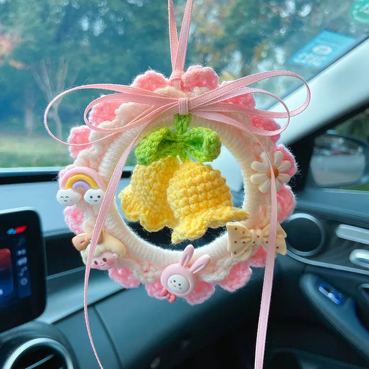 Handmade wool bell orchid car pendant hanging from rear-view mirror