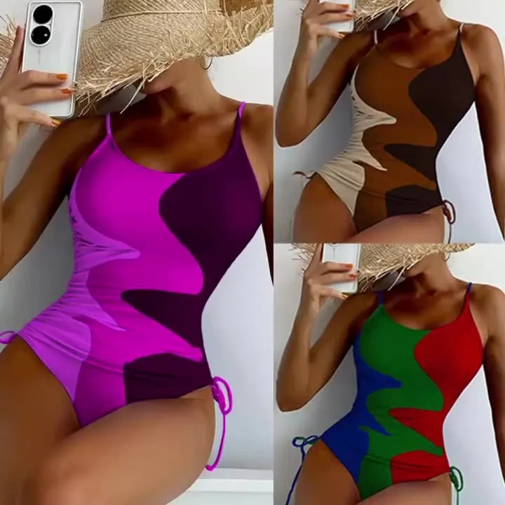 Women's blue sleeveless one-piece swimsuit with fixed trunks on a mannequin.