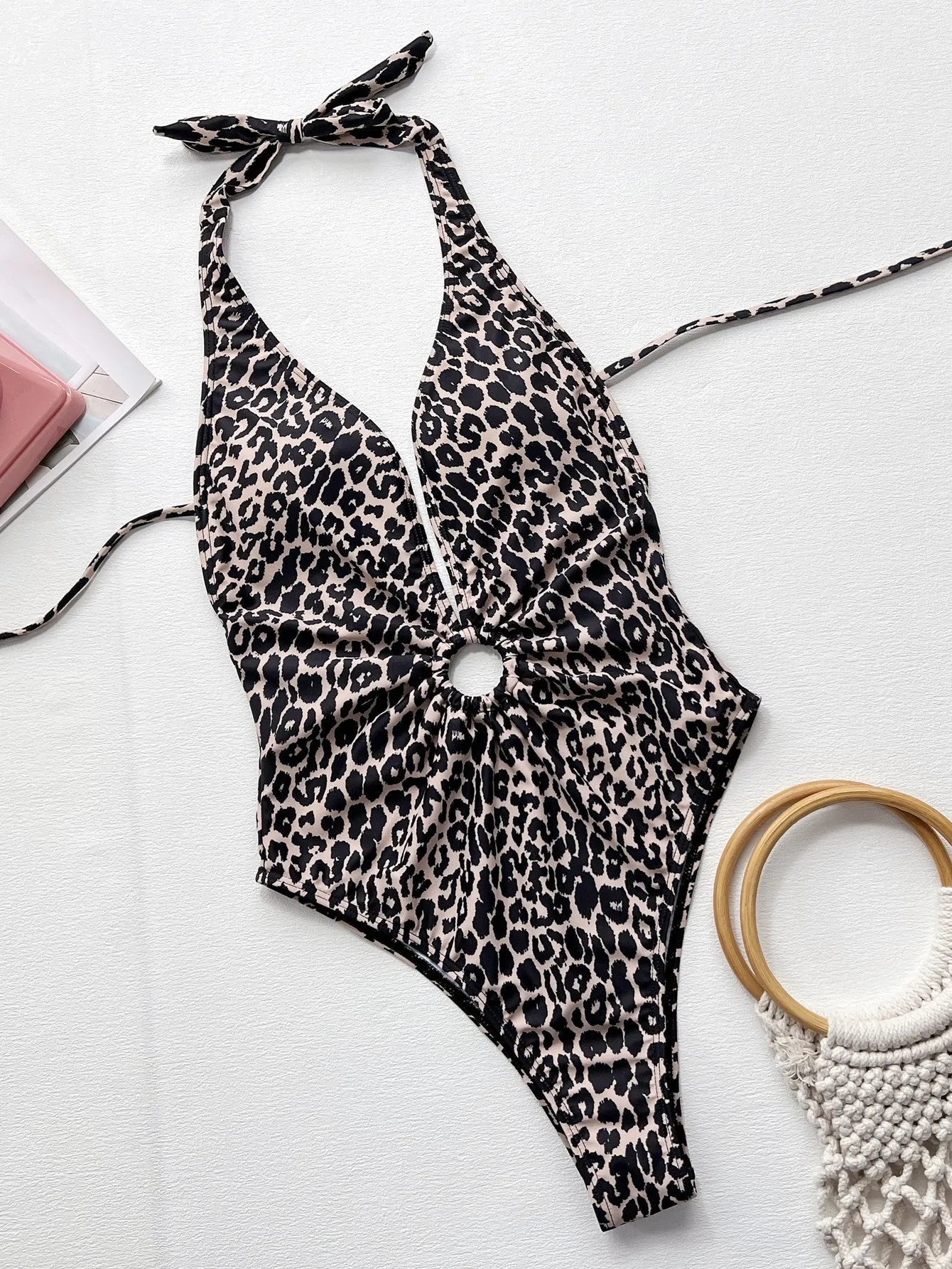 Leopard print one-piece swimsuit for women with hollow-out ring design on a bikini style.