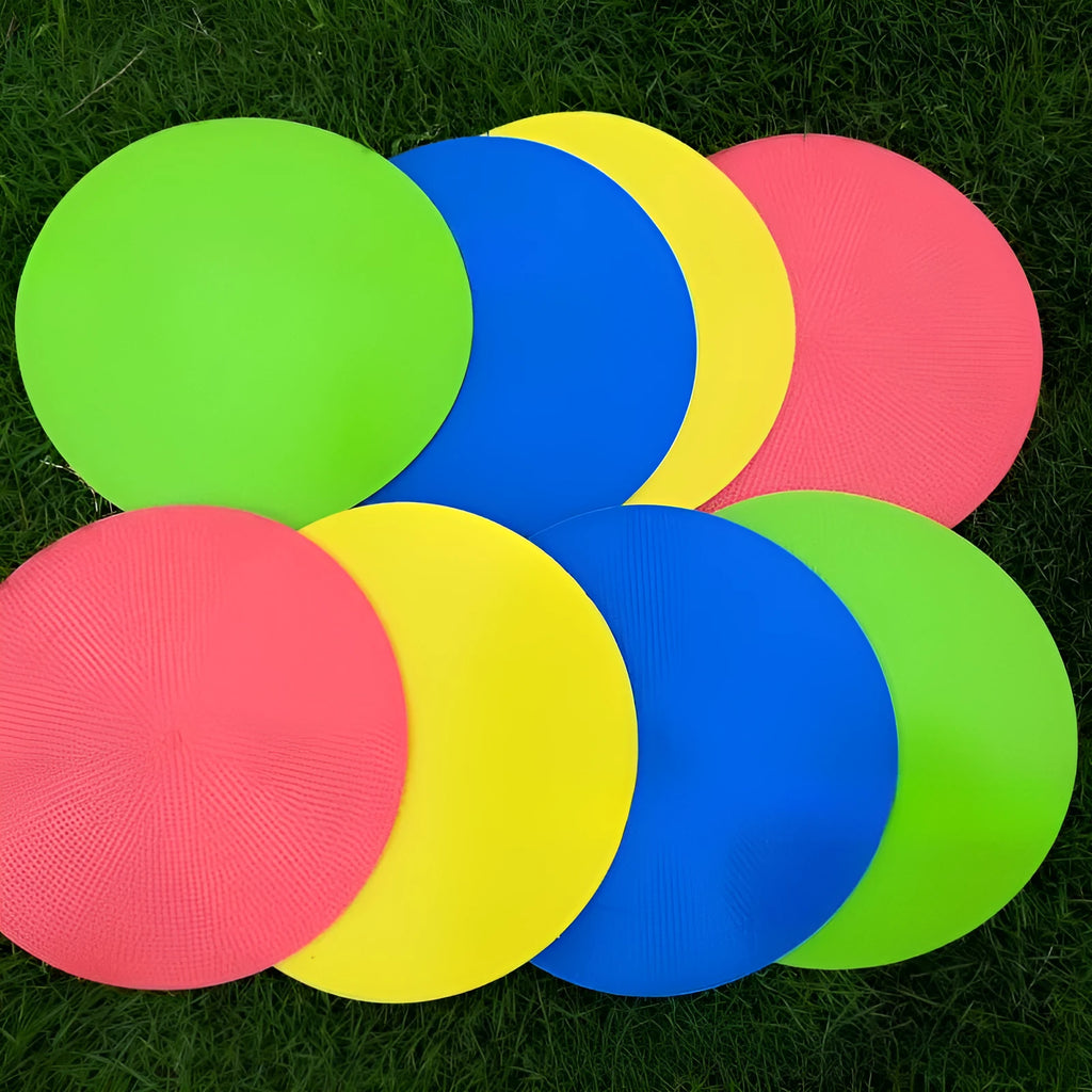 Soft yellow football landmark pad disc on grass, 23cm diameter, for training targets.