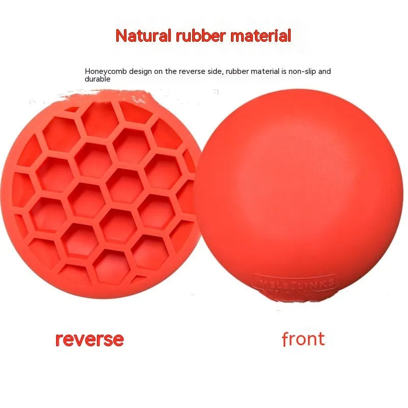 Orange natural rubber golf training mat with centre of gravity zone for swing practice