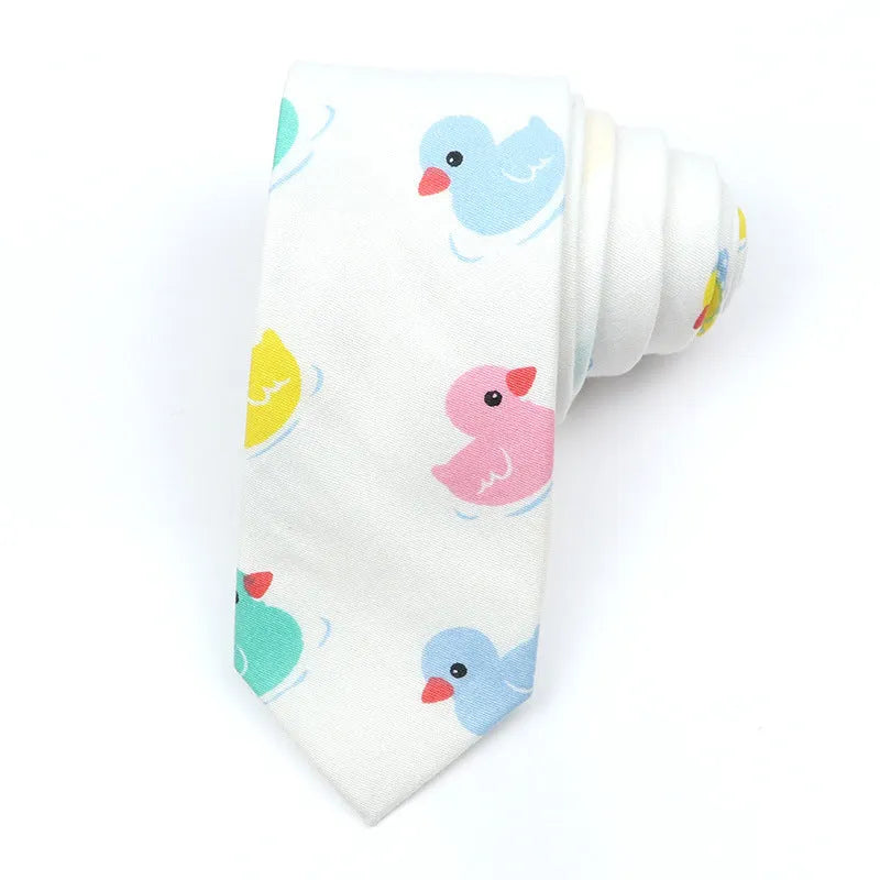 Men's narrow cotton bow tie in a cartoon print with an adjustable knot, shown in a selection of colours.