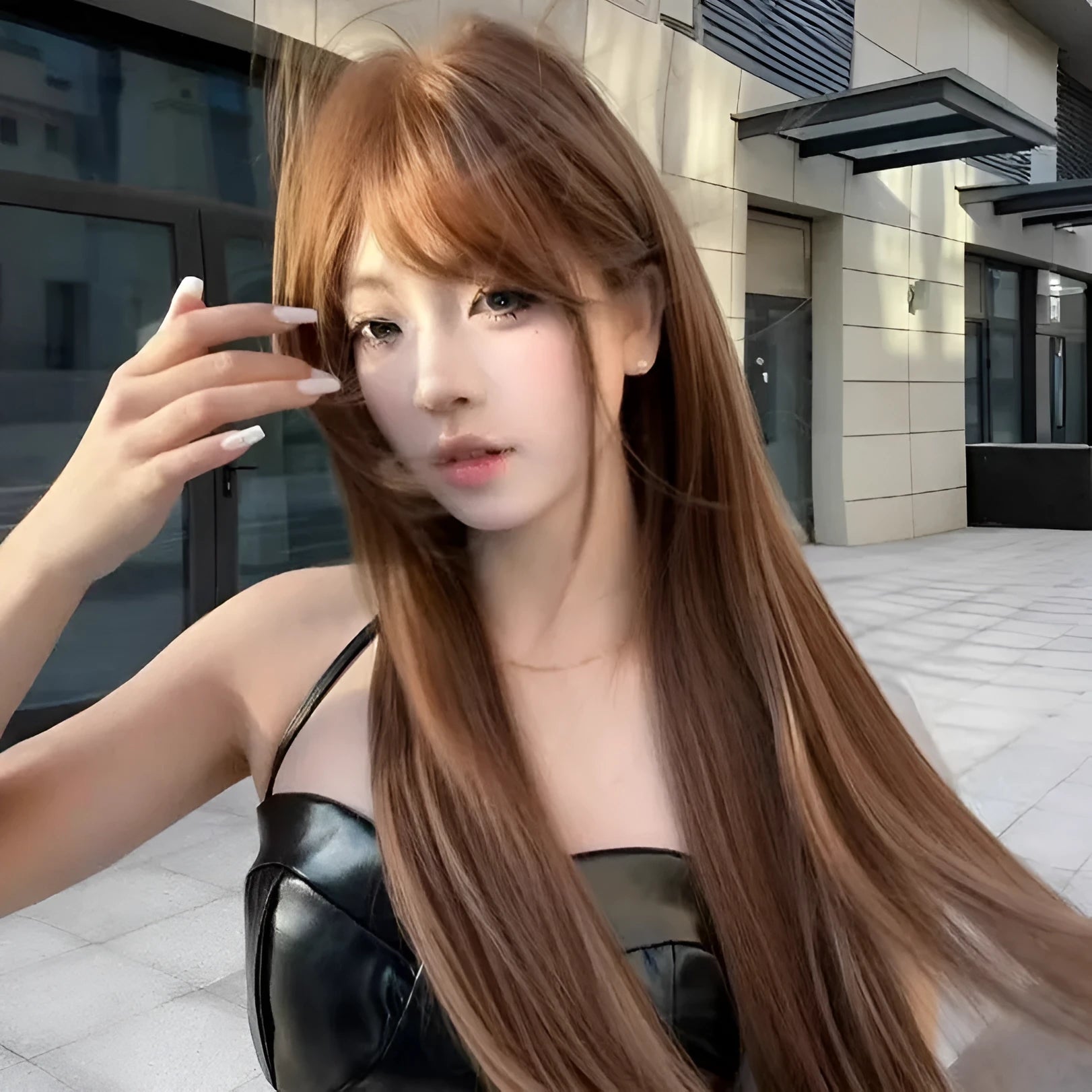 Long straight synthetic wig with bangs in warm tea chestnut brown colour