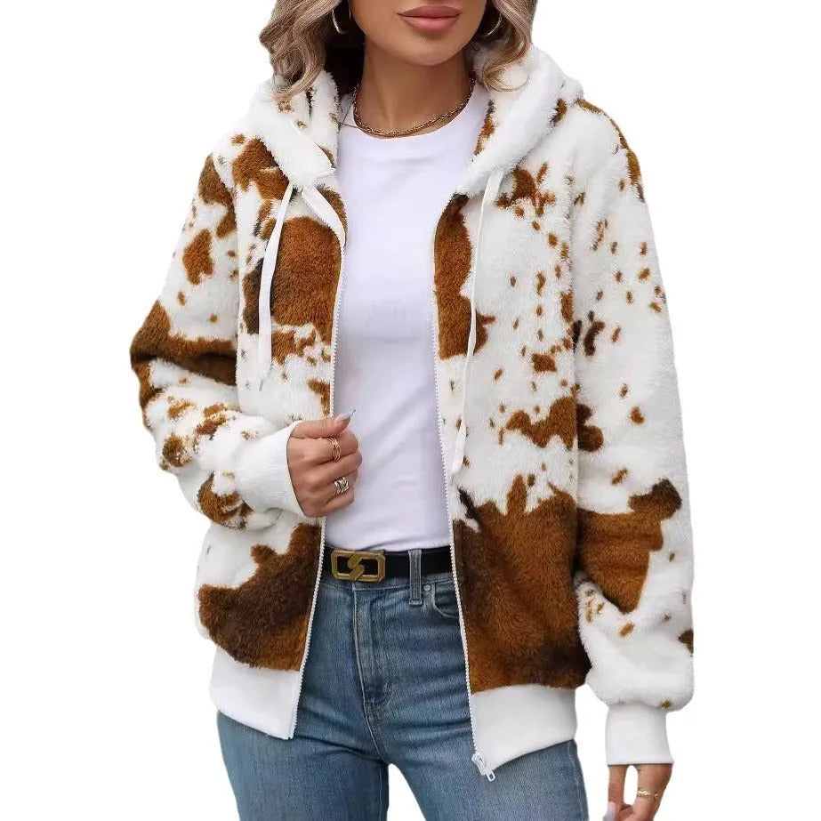 Yellow brown cow print hooded zip cardigan jacket on a hanger
