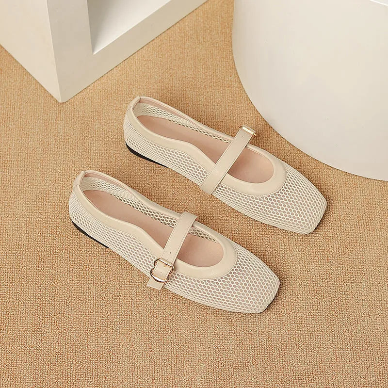 Women's beige mesh low heel pump with a buckle strap and square toe on a neutral background.