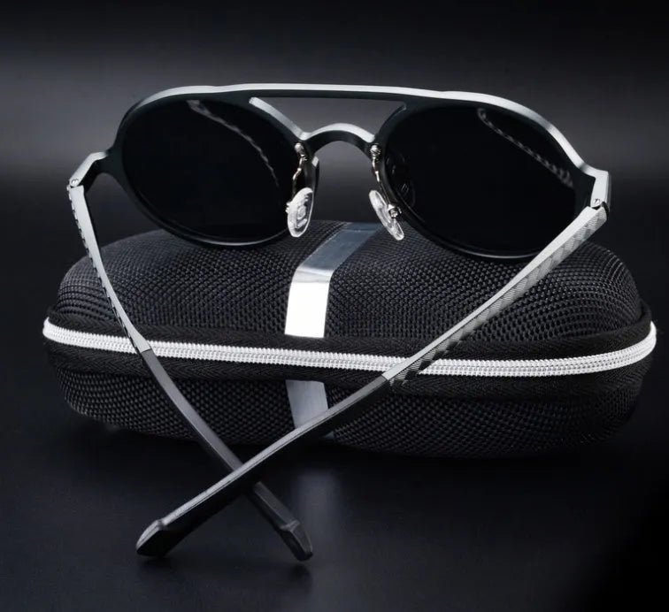 Men's polarised vintage round sunglasses with black aluminium magnesium frame and grey lens