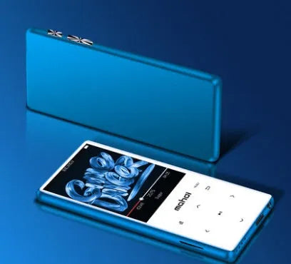 Black portable MP3 MP4 player with 2.4-inch touch screen showing music interface, placed on a desk.