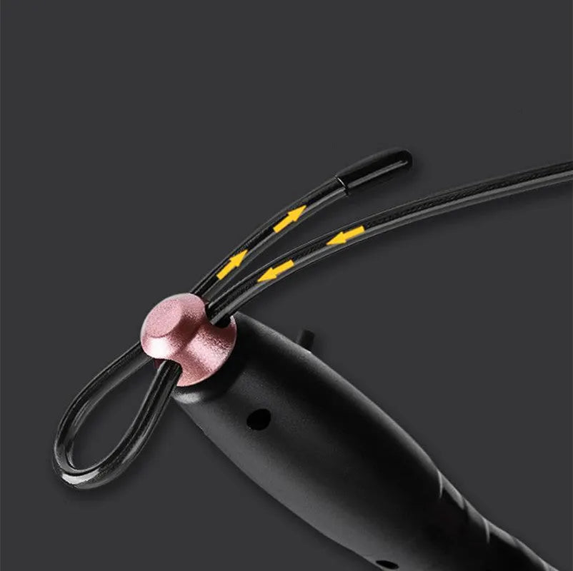 Adjustable digital skipping rope with black ABS handle and coated steel cable on white background