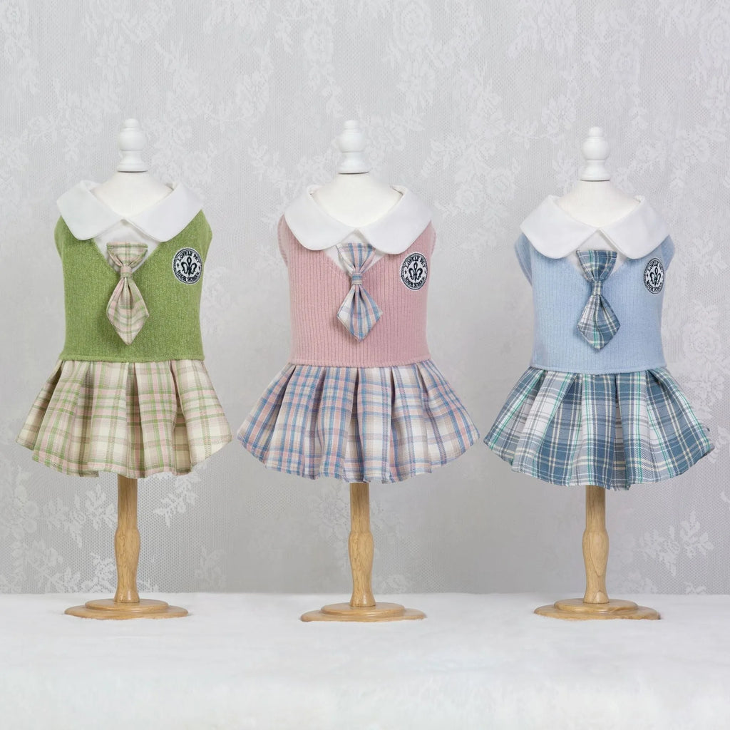 A pink, blue, or green tartan skirt for small dogs or cats in a princess costume style.