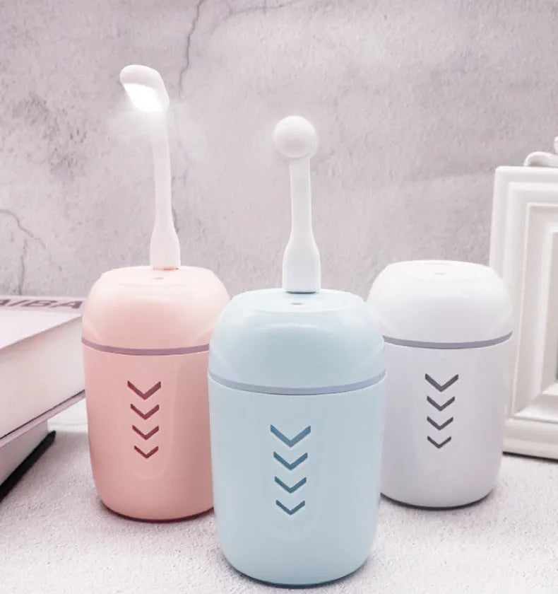 X3 portable car humidifier with columnar design in blue, pink or white colour options