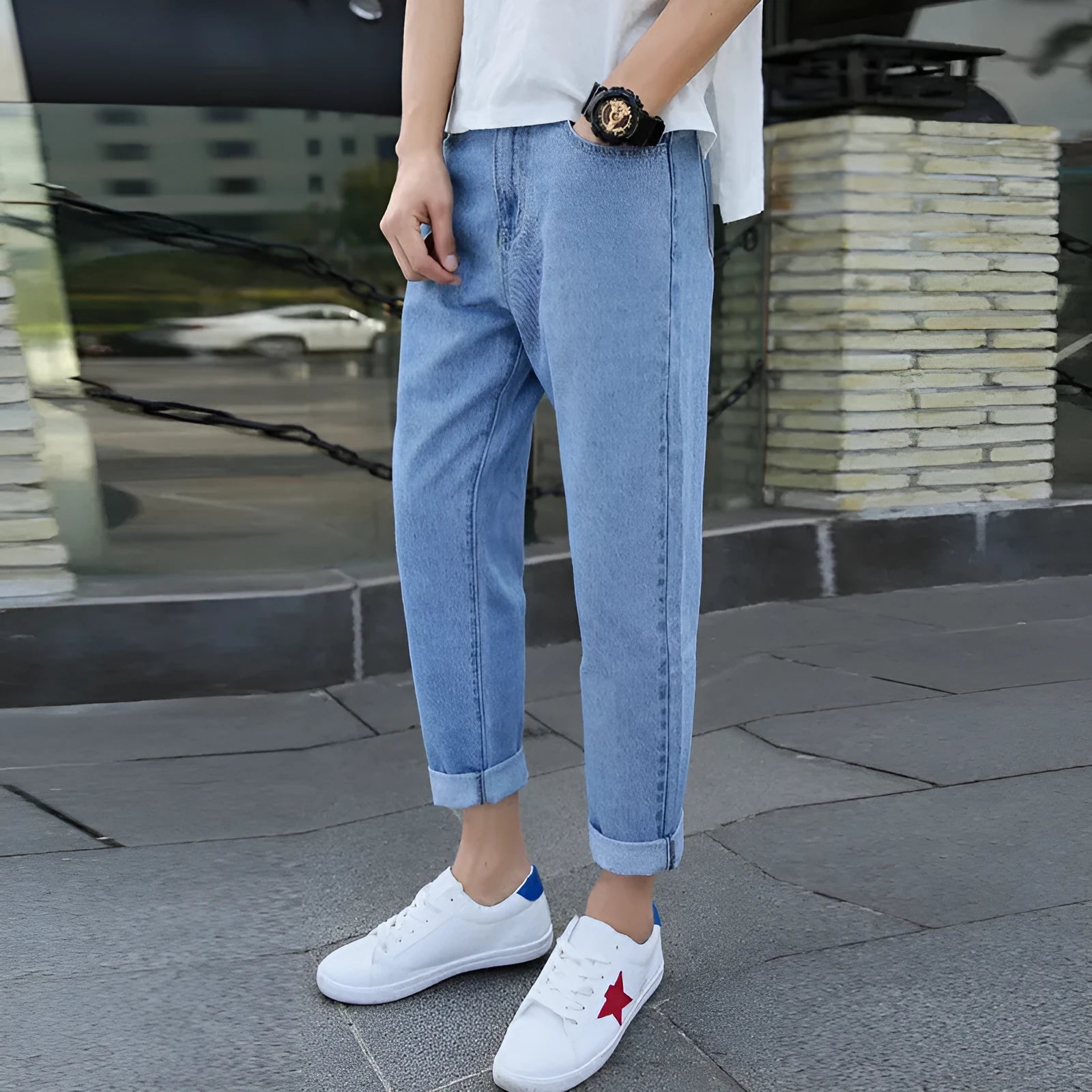 Men's straight-leg harem jeans in black or blue cotton fabric showing loose fit design