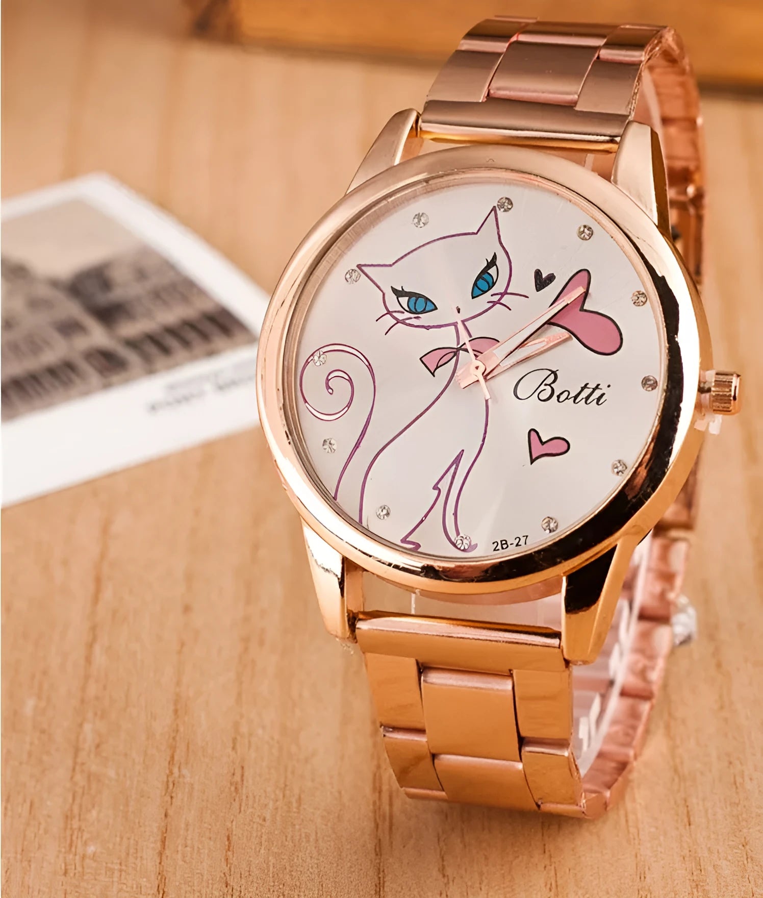 Rose gold quartz watch with white cat design on dial, alloy strap, and 40.5mm metal case