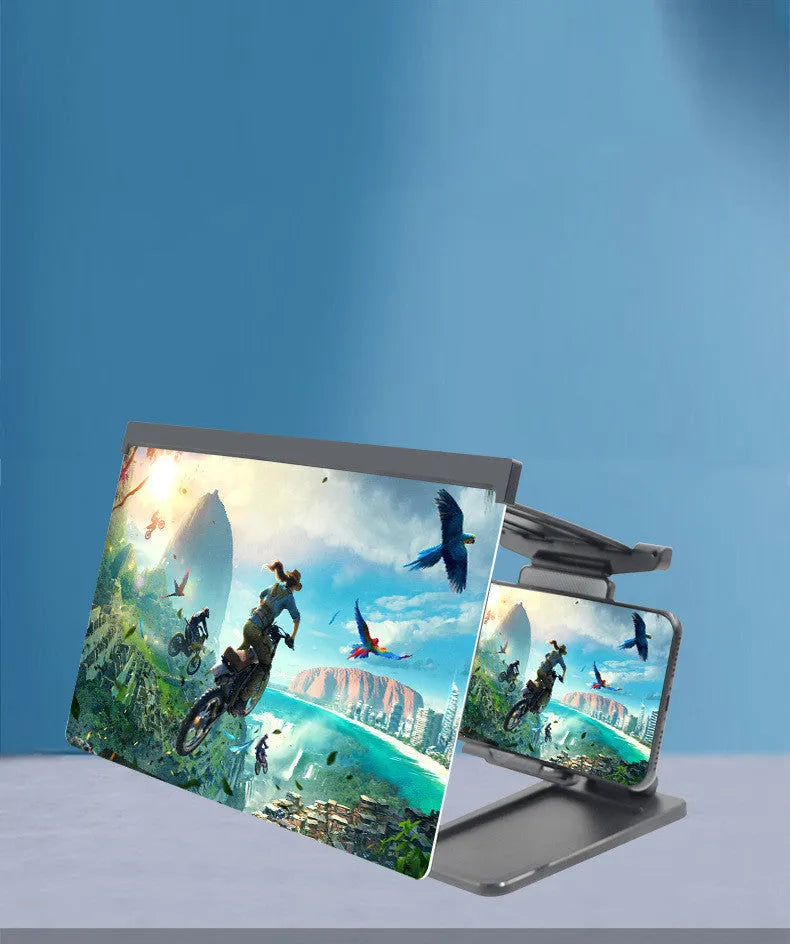 Black folding mobile phone screen magnifier with detachable phone holder on a desk.
