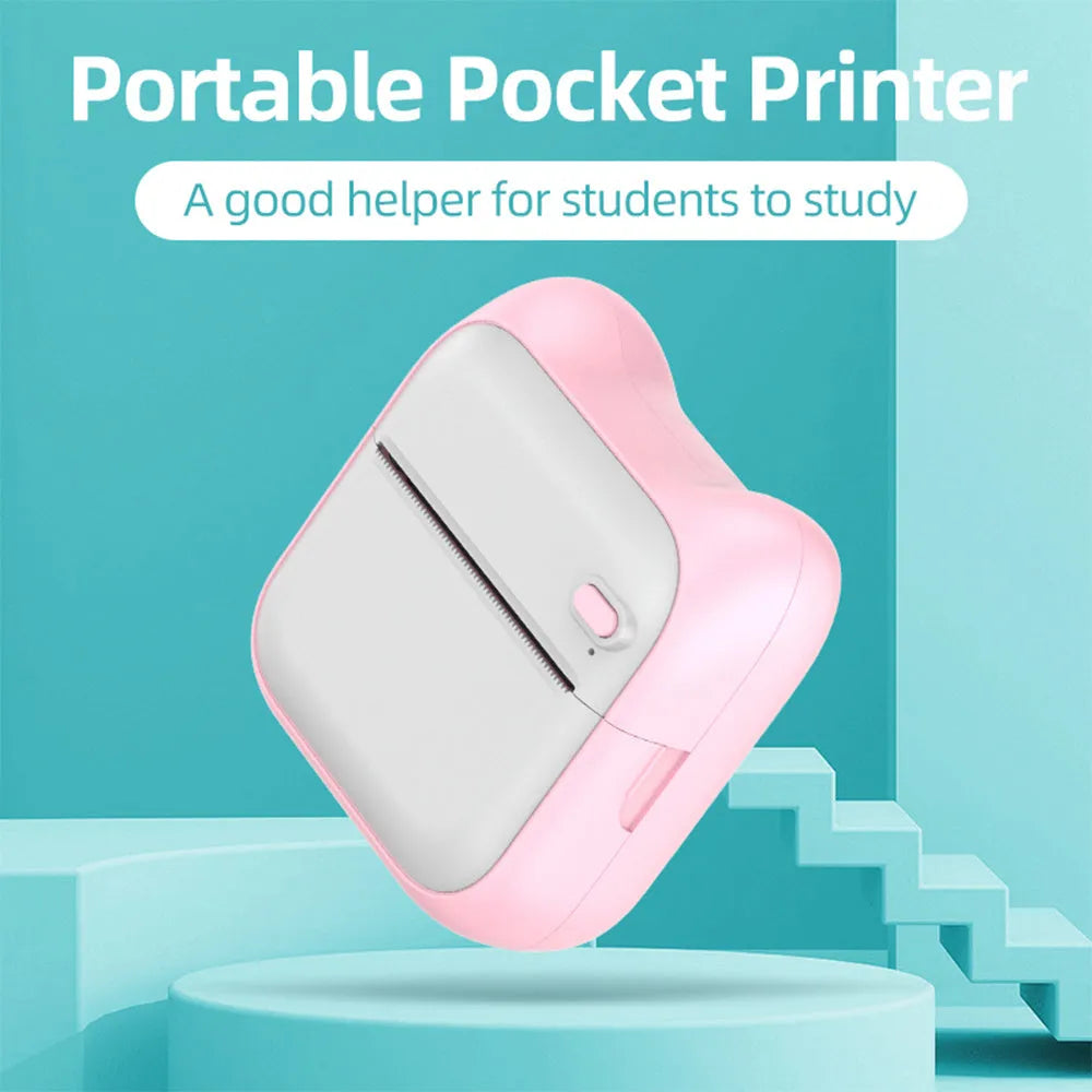 Pink mini pocket Bluetooth thermal printer on desk with USB cable, 90x45x82mm