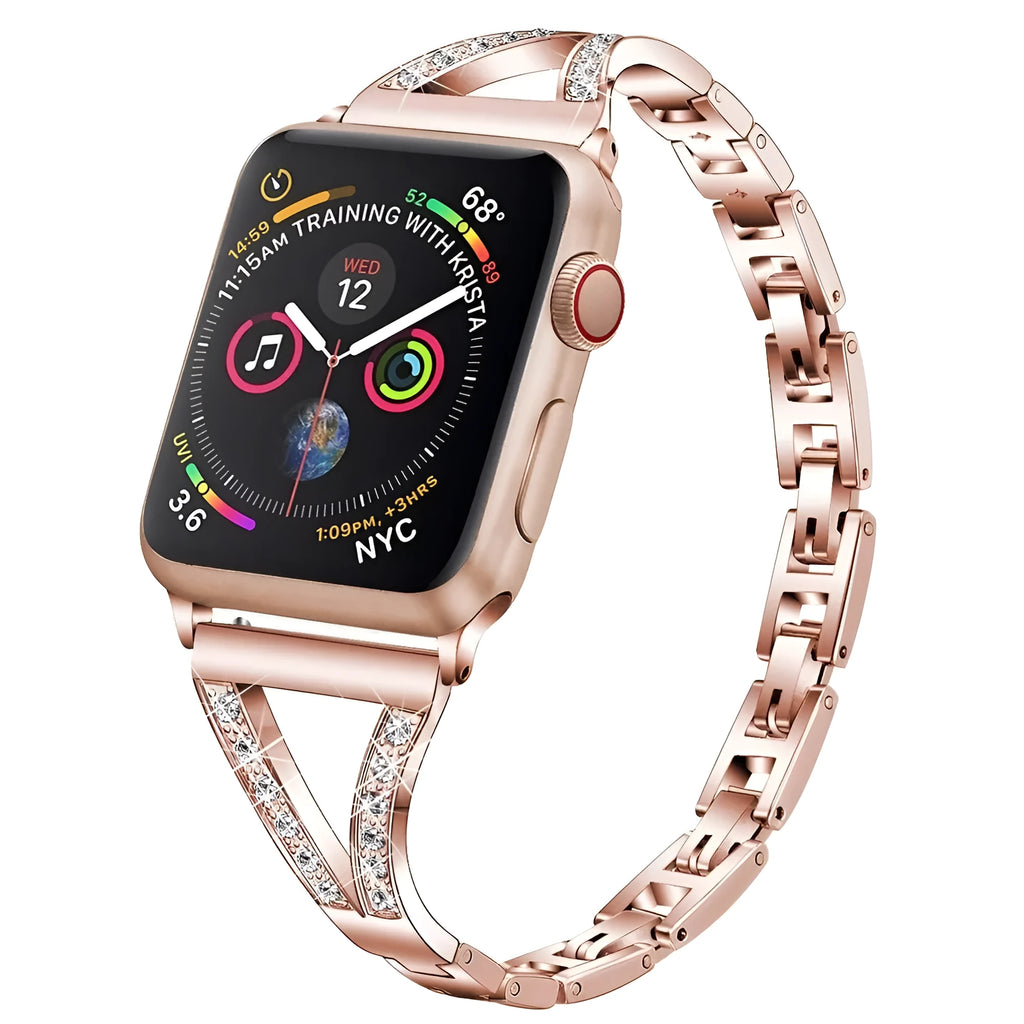 Stainless steel Apple Watch strap with diamond studs in rose gold, shown attached to a watch.