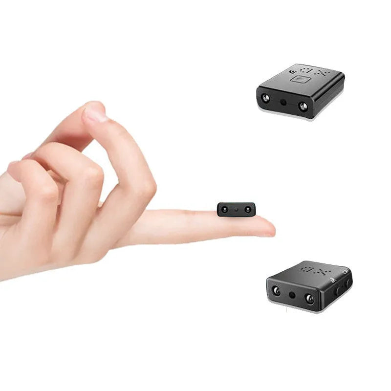 Mini Full HD 1080P night vision security camera in black, showing compact size and recording status
