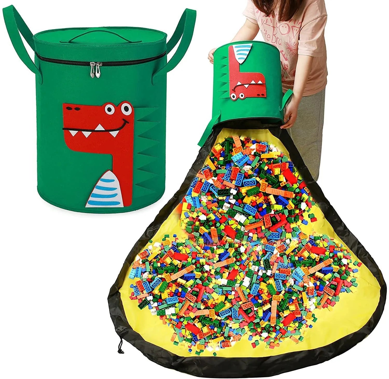 Green felt cube storage bag with pull rope, laid flat as a play mat for toys.